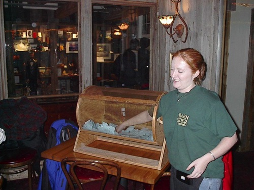 Our waitress picks a winning ticket at Barnsider Dutch Treat Dinner 11/20/2001 V0010057