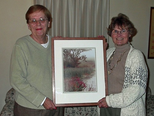 Former Chester Librarian Sally Hubart, accepts raffle prize from Norma 11/28/2001 V0010086