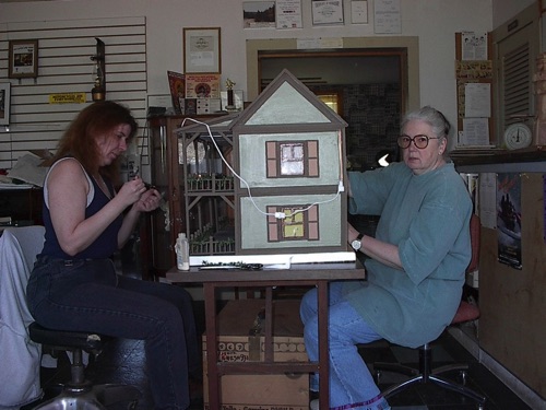 Lisa & Leslie Preparing Doll House Raffle prize April, 2002 IM002004.jpg