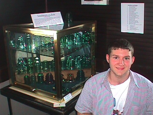 Dave with his Telegraph Insulator display. March 13, 23002. MVC-028F.JPG