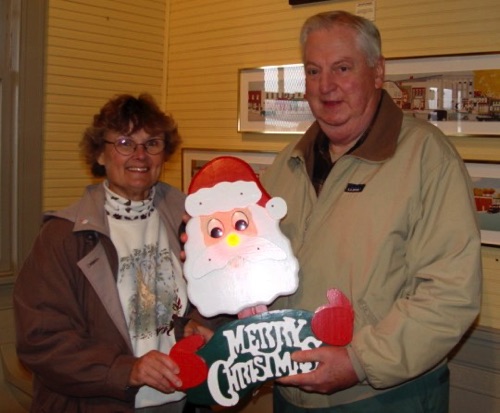 Norma presents "Santa" raffle prize to Fred - 11/19/2003DSC00484.