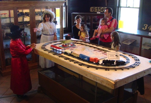 Family enjoys the trains at 1915 Erie Station on Opening Day. 2015-05-2 (Photo by Leslie Smith) DSC03648.jpg