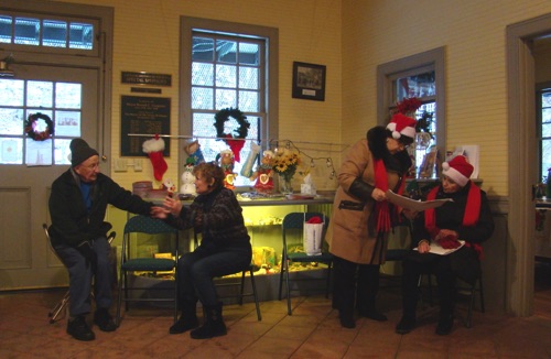 E.J., Norma, Sheila and Lynn enjoy conversations before the parade started. (Leslie Smith photo) 2017-12-10 DSC00942