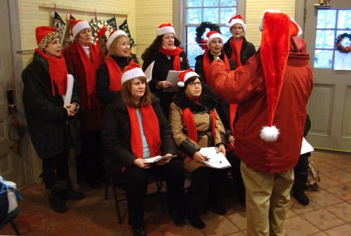 Song of the Valley Sweet Adelines preforming/warming up in the Station before venturing outside. (Leslie Smith photo) DSC00947.jpg